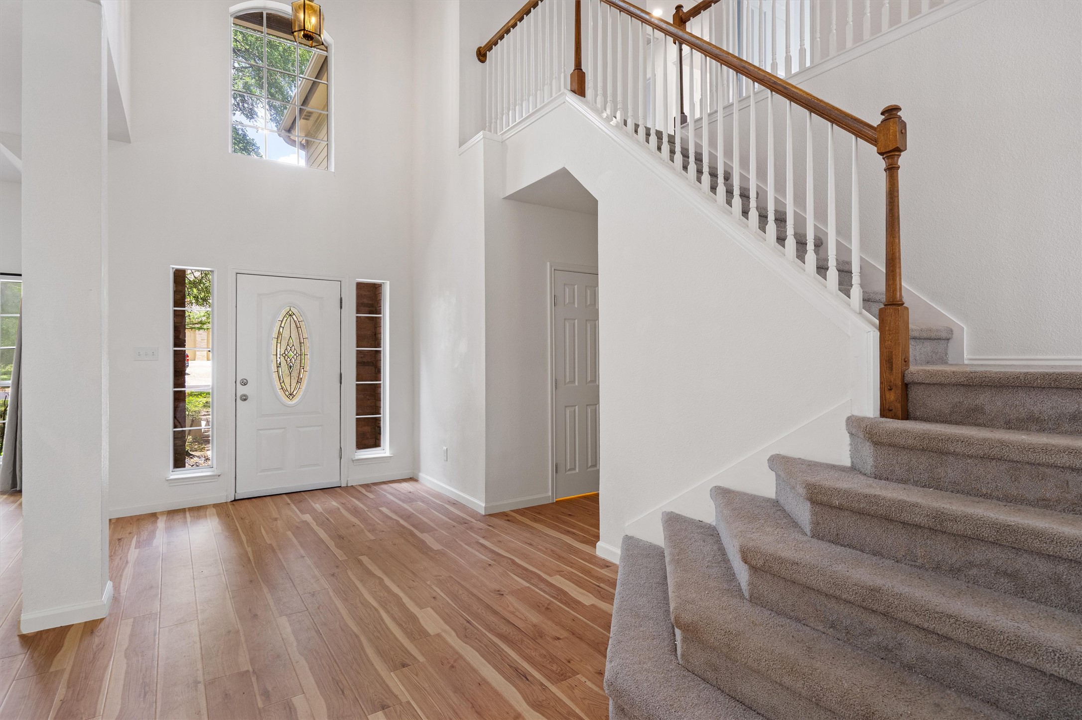 100 Parque Circle Georgetown, TX 78626 - Photo 3 of 39 a view of entryway and hall with wooden floor