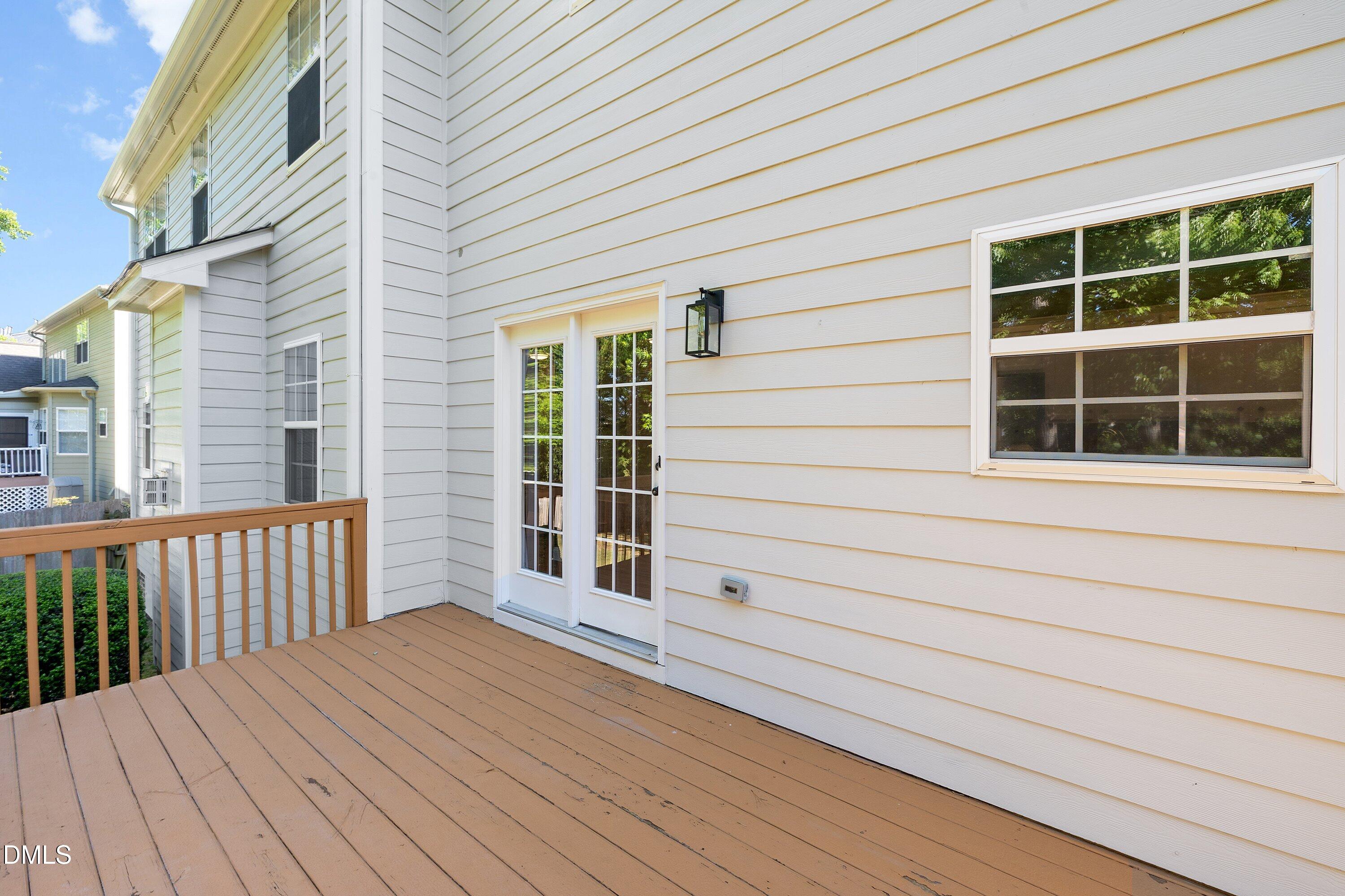 3717 Windmeade Road Wake Forest, NC 27587 - Photo 48 of 51 a view of a house with wooden deck