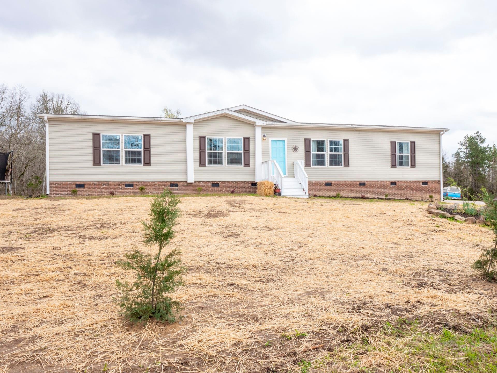 550 North Burris Road Sharon, SC 29742 - Photo 2 of 34 a big house with yard and a large tree