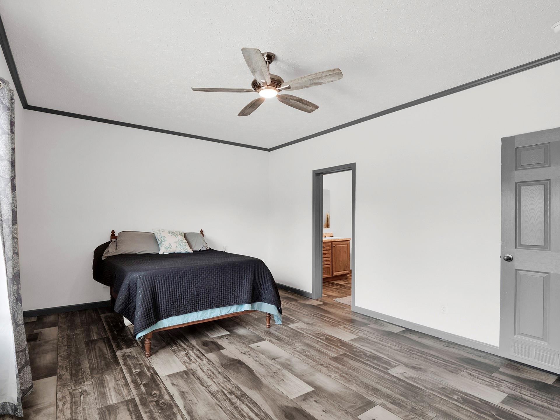 550 North Burris Road Sharon, SC 29742 - Photo 23 of 34 a view of a livingroom with wooden floor and a ceiling fan