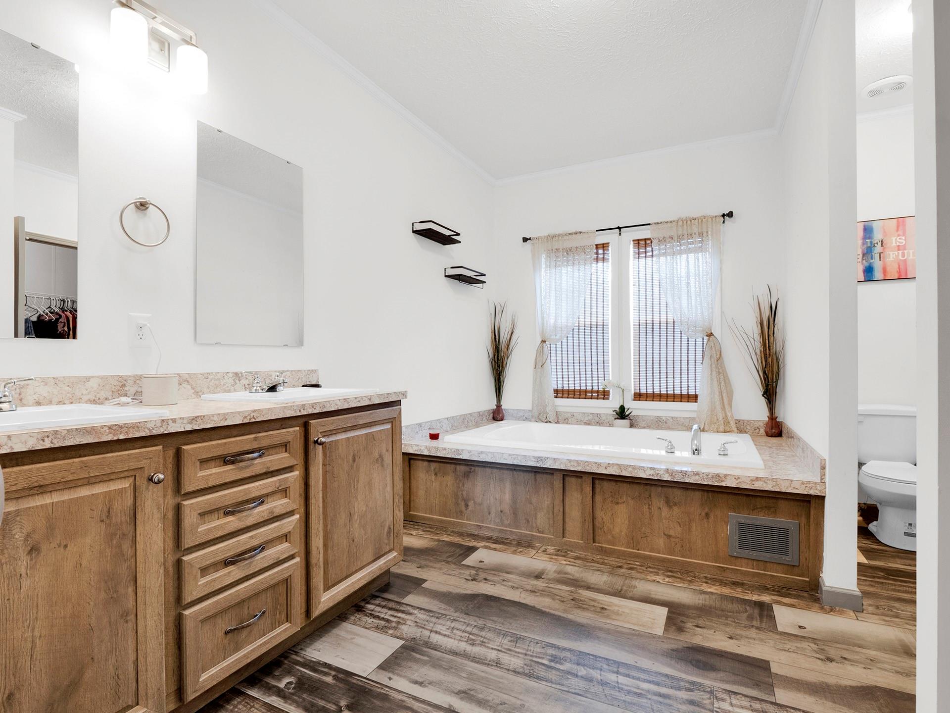 550 North Burris Road Sharon, SC 29742 - Photo 25 of 34 a view of bathroom with double vanity sink and a mirror
