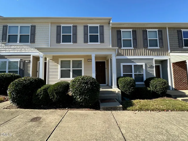 a view of a house with a garden