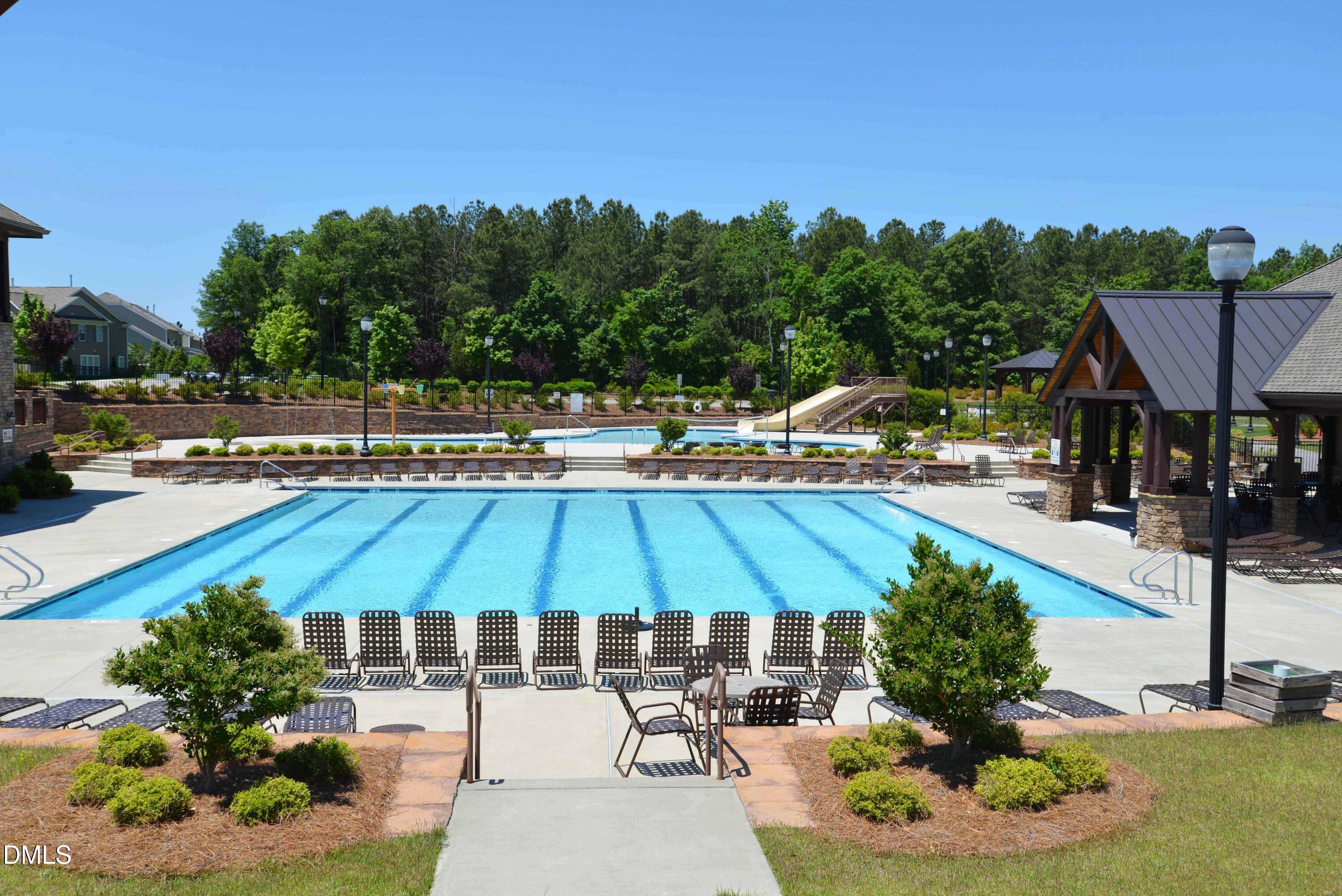 3904 Swinton Street Raleigh, NC 27616 - Photo 14 of 20 a view of a swimming pool with sitting area and furniture