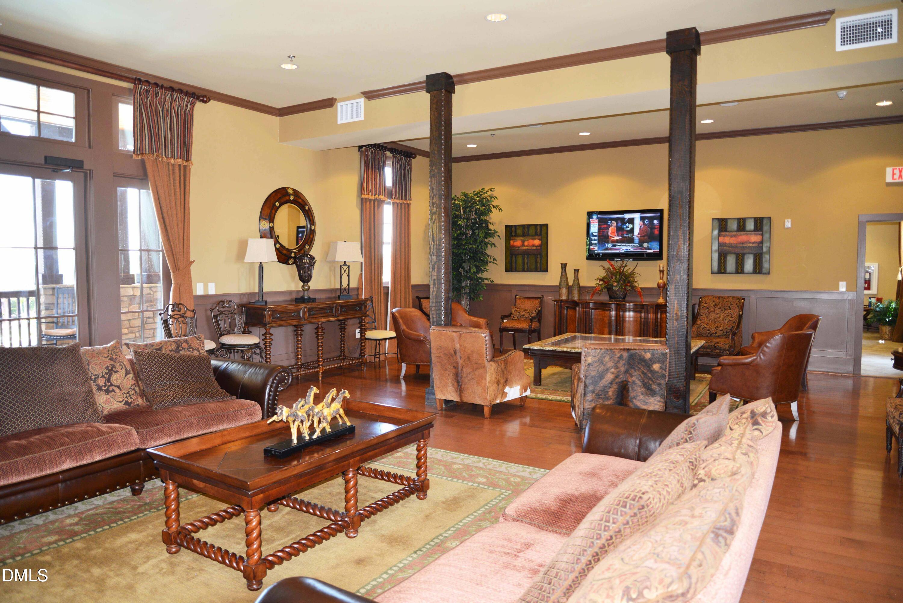 3904 Swinton Street Raleigh, NC 27616 - Photo 15 of 20 a living room with furniture and a large window