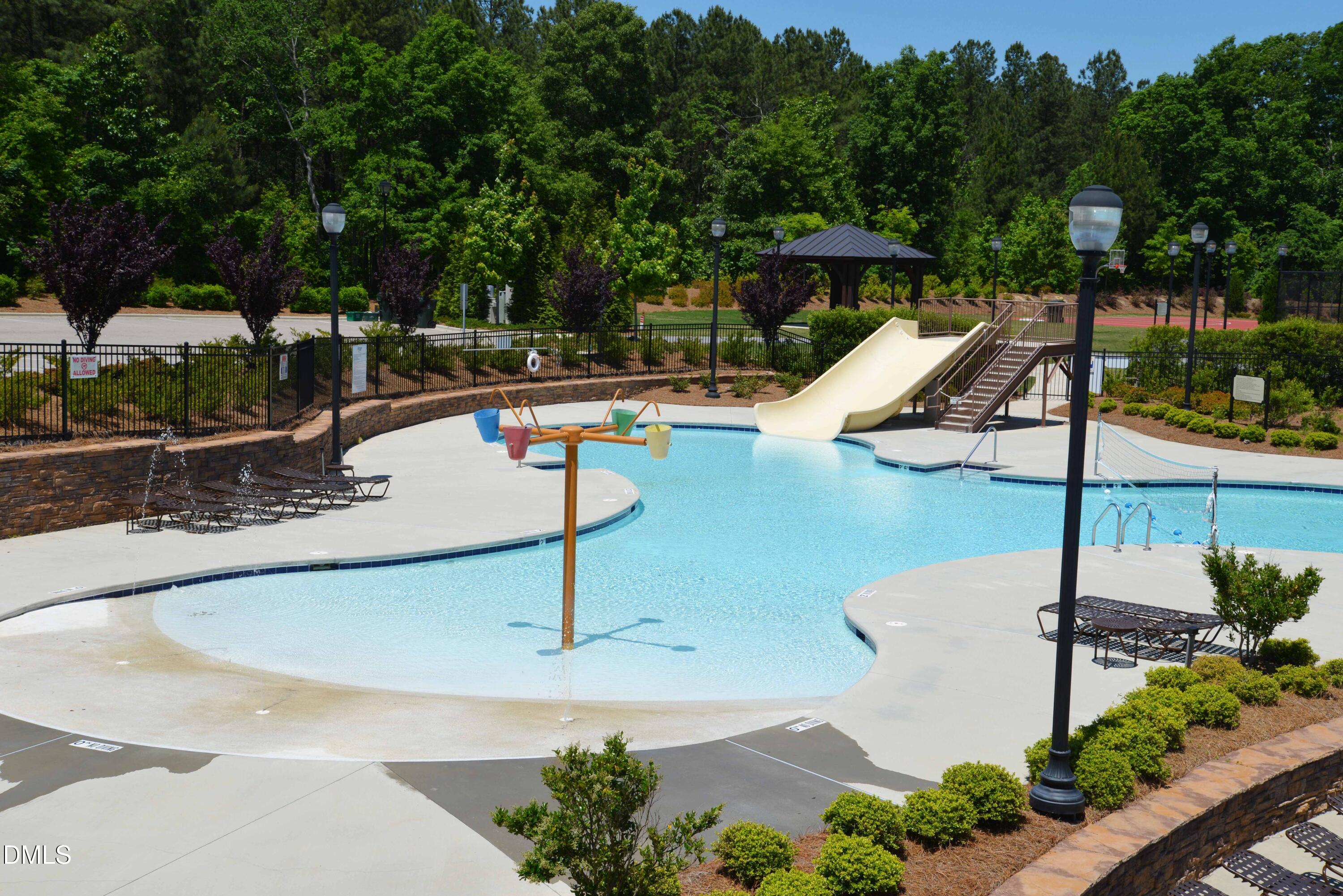 3904 Swinton Street Raleigh, NC 27616 - Photo 17 of 20 a view of a swimming pool with a patio
