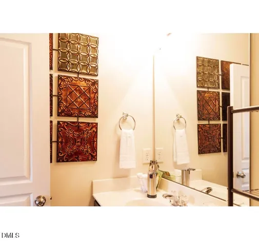 a bedroom with a bed and a cabinets