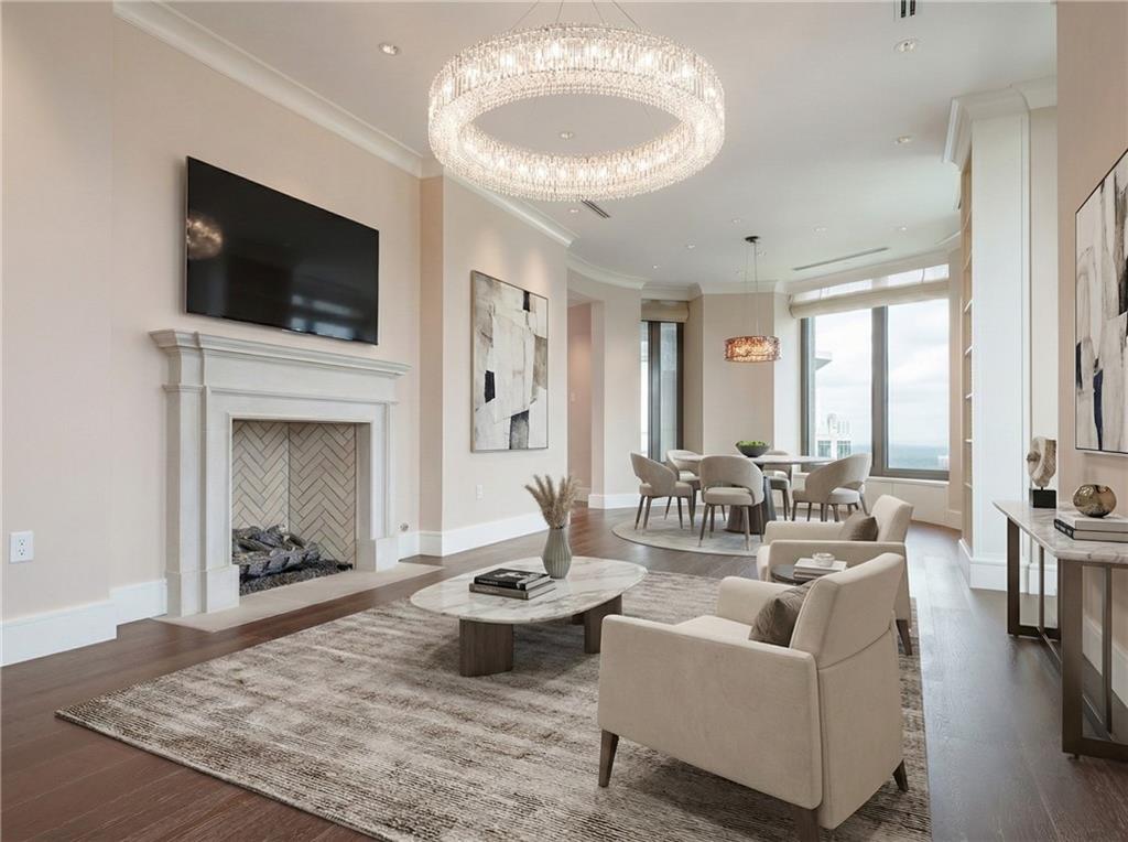 3376 Peachtree Road Northeast, Unit 35A Atlanta, GA 30326 - Photo 2 of 23 a living room with furniture and a flat screen tv
