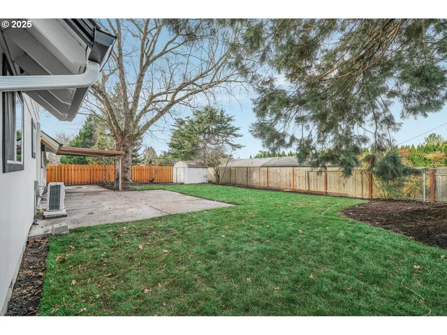 a view of a yard with a slide