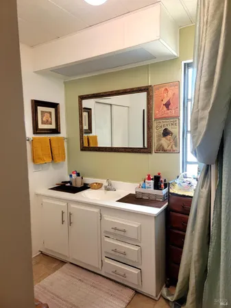 a utility room with sink dryer and washer