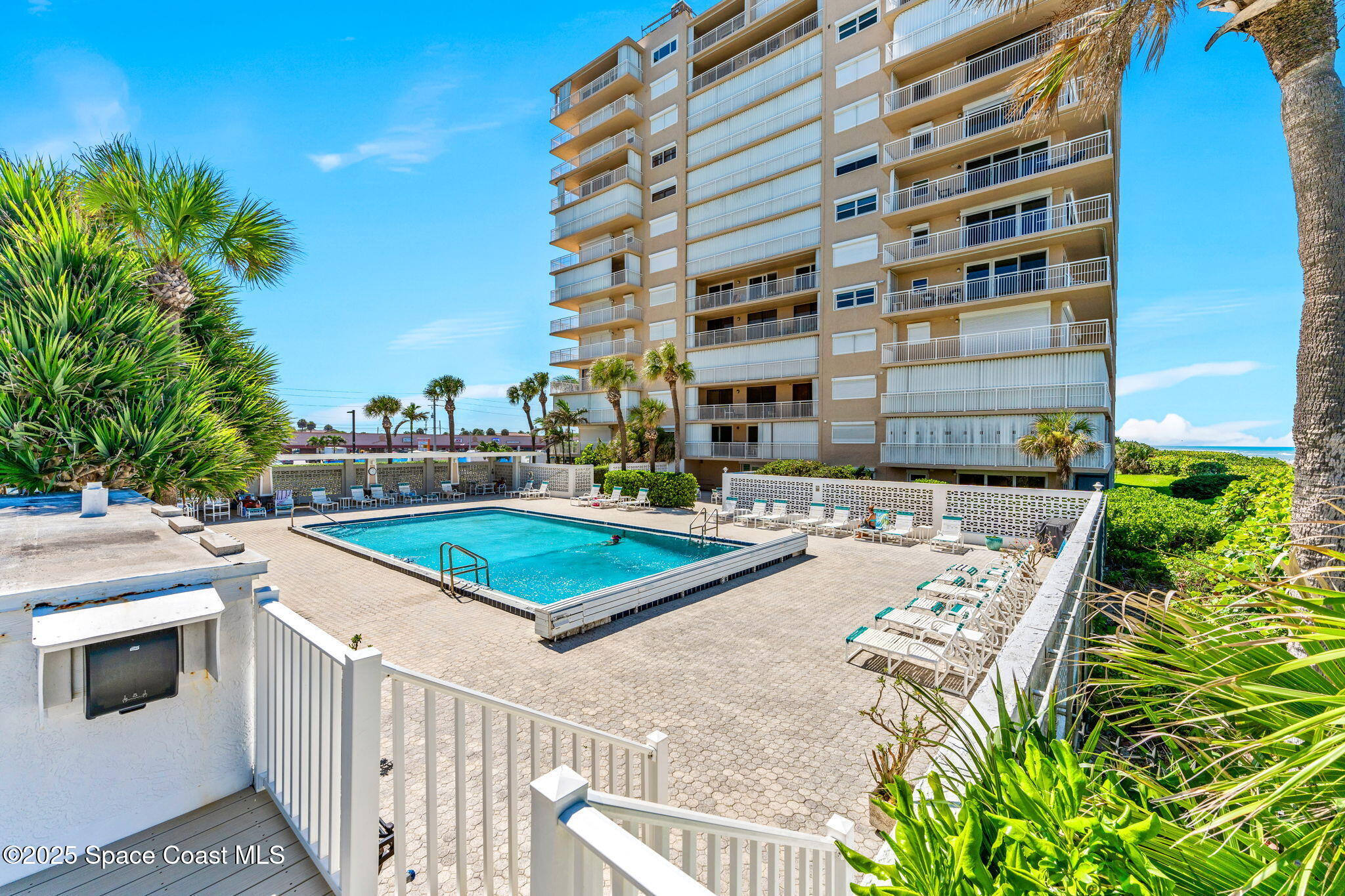 877 N Highway, Unit 904 Indialantic, FL 32903 - Photo 26 of 42 a view of an buildings with swimming pool