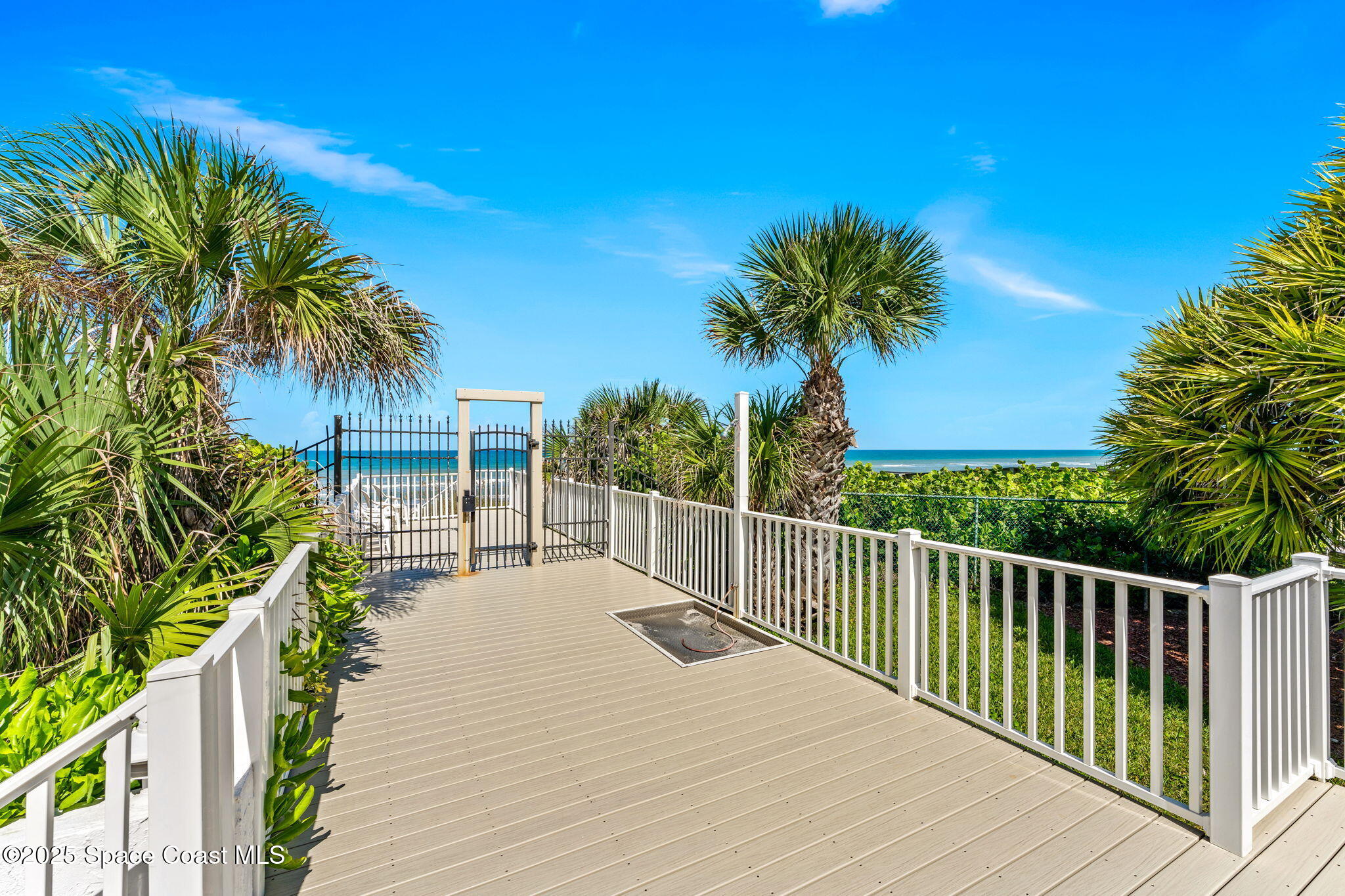 877 N Highway, Unit 904 Indialantic, FL 32903 - Photo 30 of 42 a balcony with view of palm trees