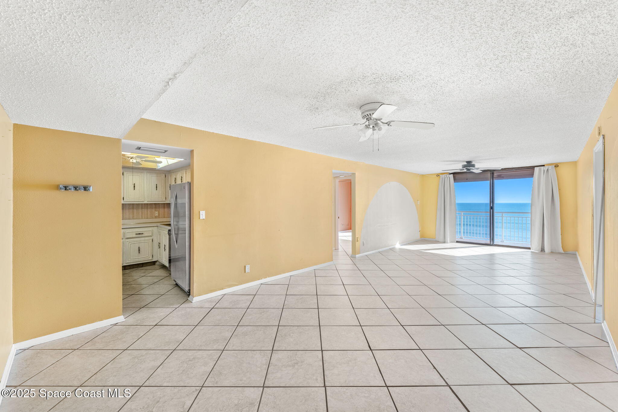 877 N Highway, Unit 904 Indialantic, FL 32903 - Photo 4 of 42 a view of an empty room and a windows