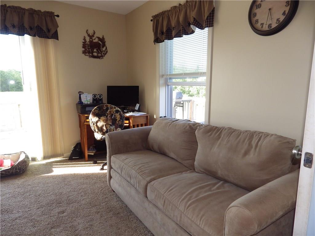 64 Foss Road Rome, ME 04963 - Photo 22 of 27 Resting this open and sunny living room.