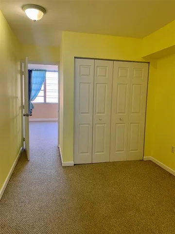 an empty room with closet