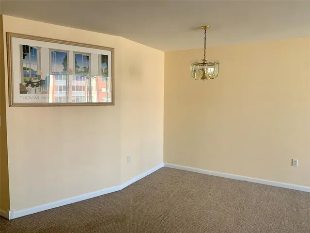 a view of empty room with windows