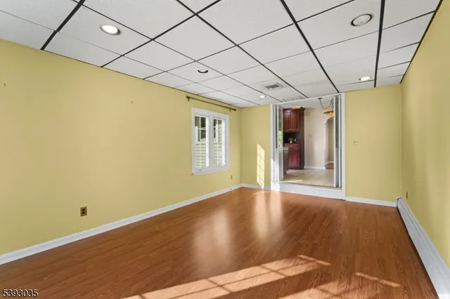 a view of livingroom with window and wooden floor