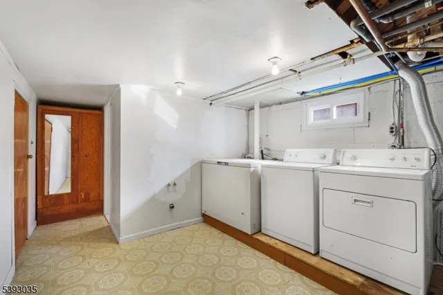 a bathroom with a sink vanity and mirror