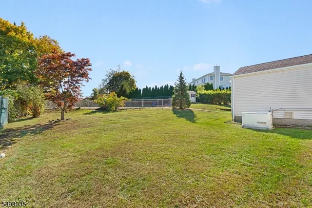 a view of swimming pool with a yard