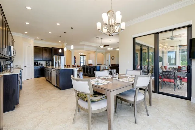 a bathroom with a bathtub shower sink vanity mirror and toilet