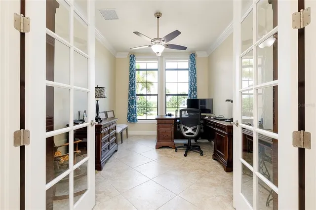 a view of dinning table and chairs in the balcony