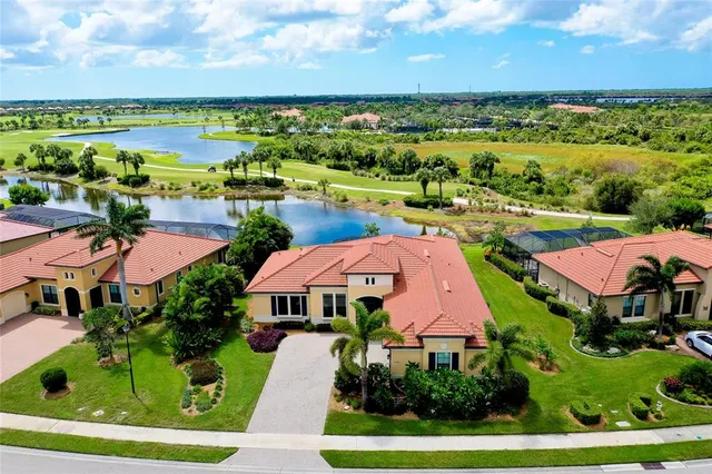 a front view of a house with yard