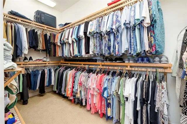 a front view of a house with a yard and a garage