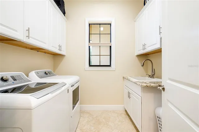 a view of a house with a yard porch and sitting area