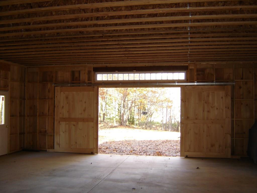 33 Bridge Road Brooksville, ME 04617 - Photo 29 of 35 Looking out from the barn towards...