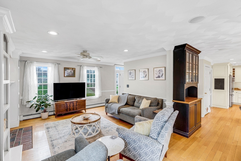 54 Old Merrill Street Amesbury, MA 01913 - Photo 6 of 34 a living room with furniture and a flat screen tv