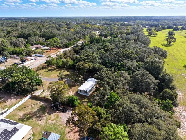 a view of a lake with a house