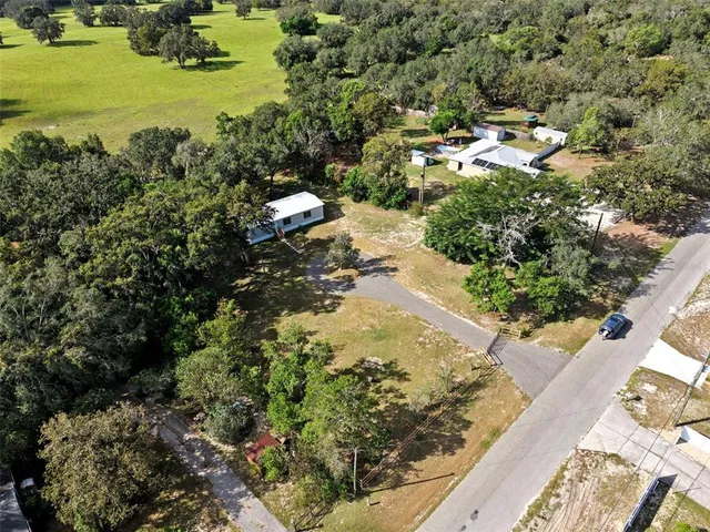 a view of a lake with a yard