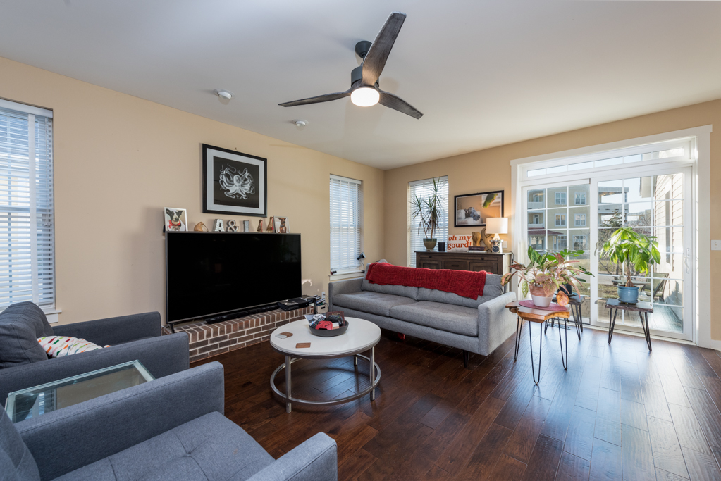 1004 Harris Road Grayslake, IL 60030 - Photo 2 of 24 a living room with furniture and a fireplace