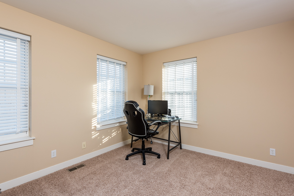1004 Harris Road Grayslake, IL 60030 - Photo 13 of 24 a work room with furniture and windows