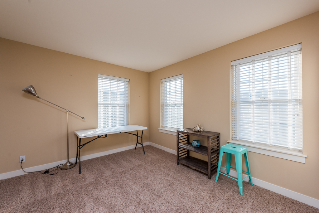 1004 Harris Road Grayslake, IL 60030 - Photo 14 of 24 a living room with furniture and a window