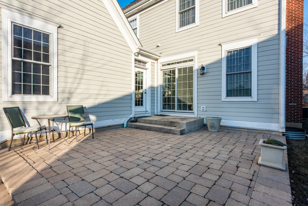 1004 Harris Road Grayslake, IL 60030 - Photo 22 of 24 a backyard of a house with outdoor seating