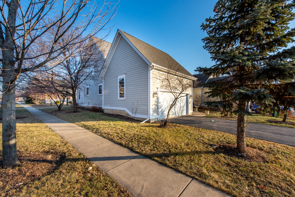 1004 Harris Road Grayslake, IL 60030 - Photo 23 of 24 a front view of a house with a yard