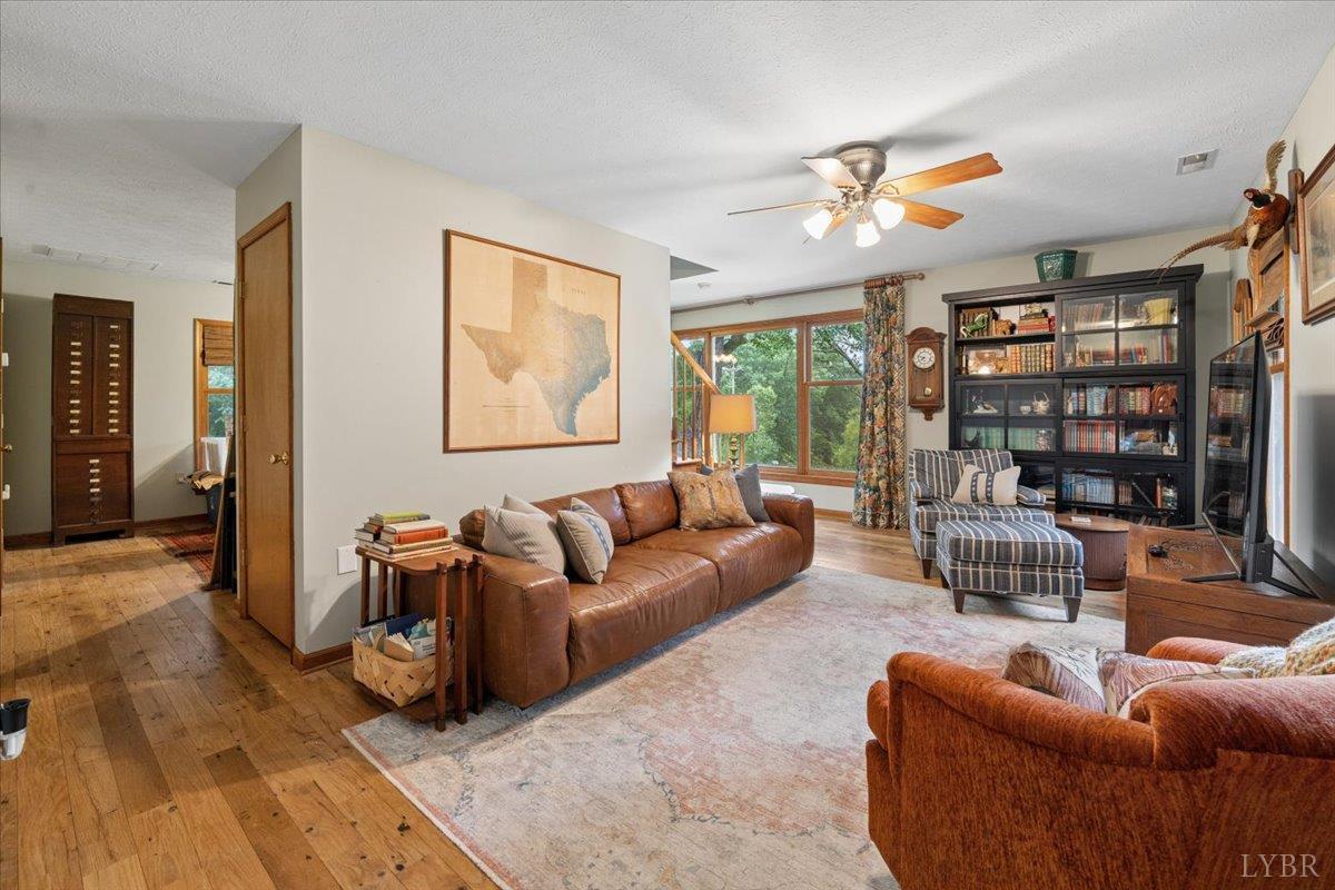 3289 Peaks Road Bedford, VA 24523 - Photo 28 of 71 a living room with furniture and a large window