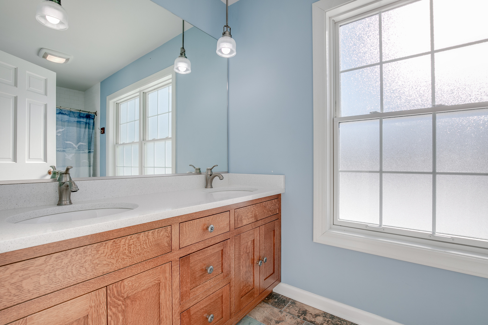 21242 West Long Grove Road Kildeer, IL 60047 - Photo 24 of 42 a bathroom with a sink and a window