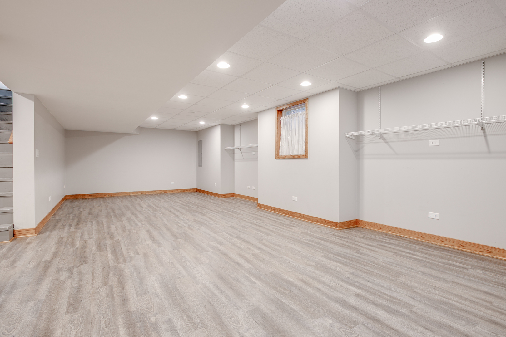 21242 West Long Grove Road Kildeer, IL 60047 - Photo 34 of 42 a view of an empty room with wooden floor and a window