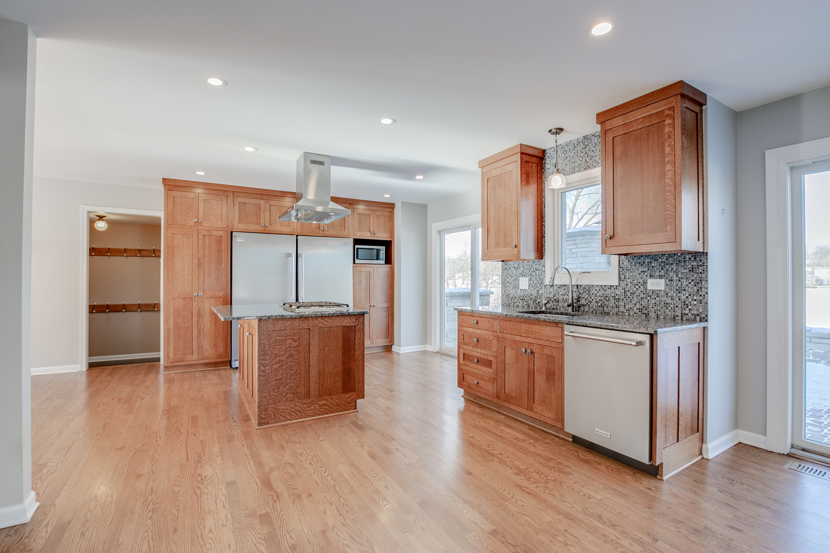21242 West Long Grove Road Kildeer, IL 60047 - Photo 10 of 42 a kitchen with stainless steel appliances granite countertop a stove a sink and a refrigerator