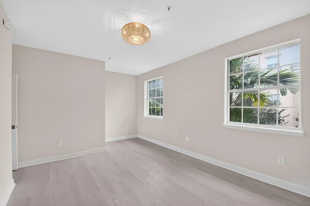 an empty room with windows