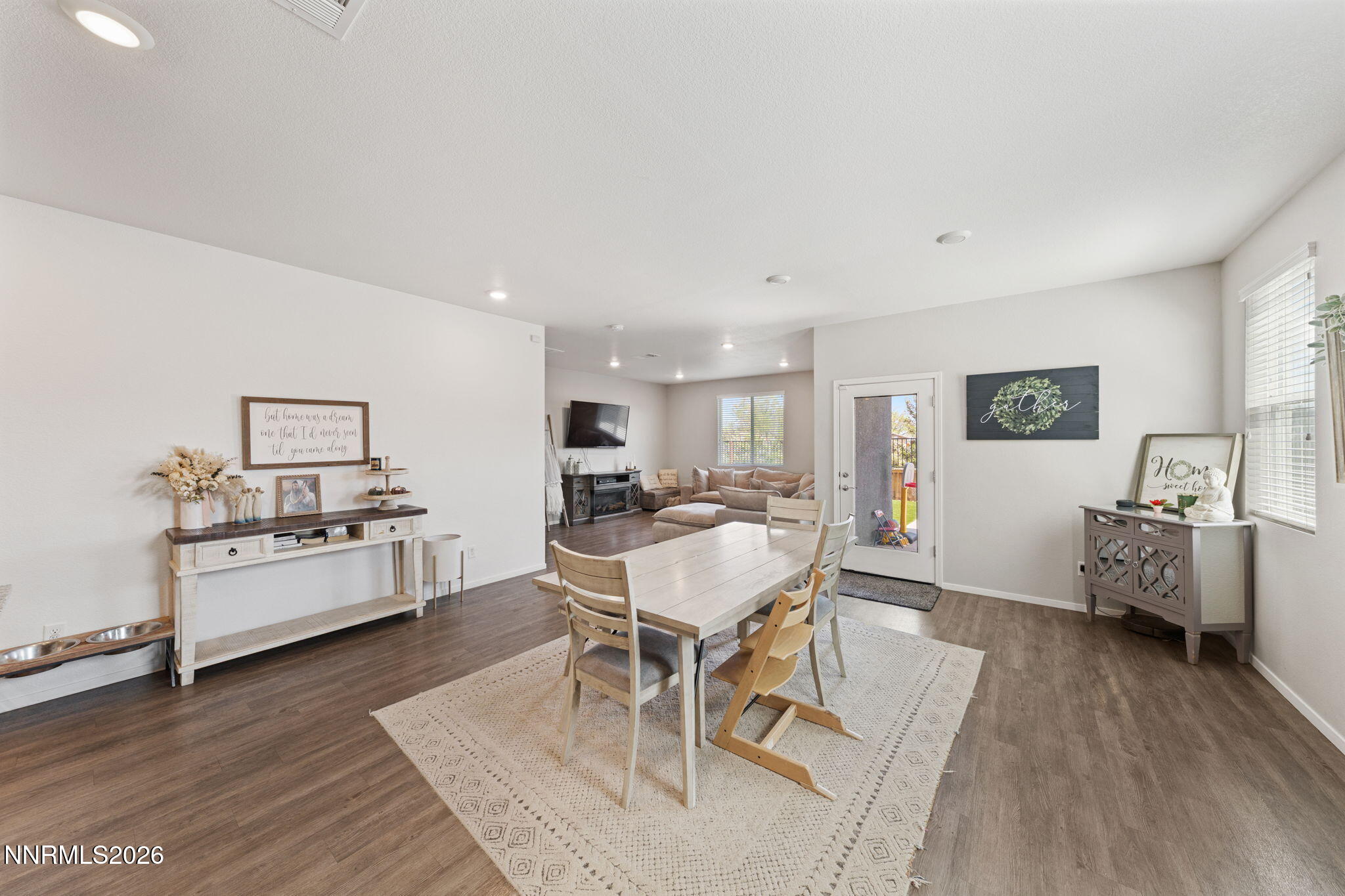9708 Sea Glass Drive Reno, NV 89506 - Photo 29 of 51 a living room with furniture and a wooden floor