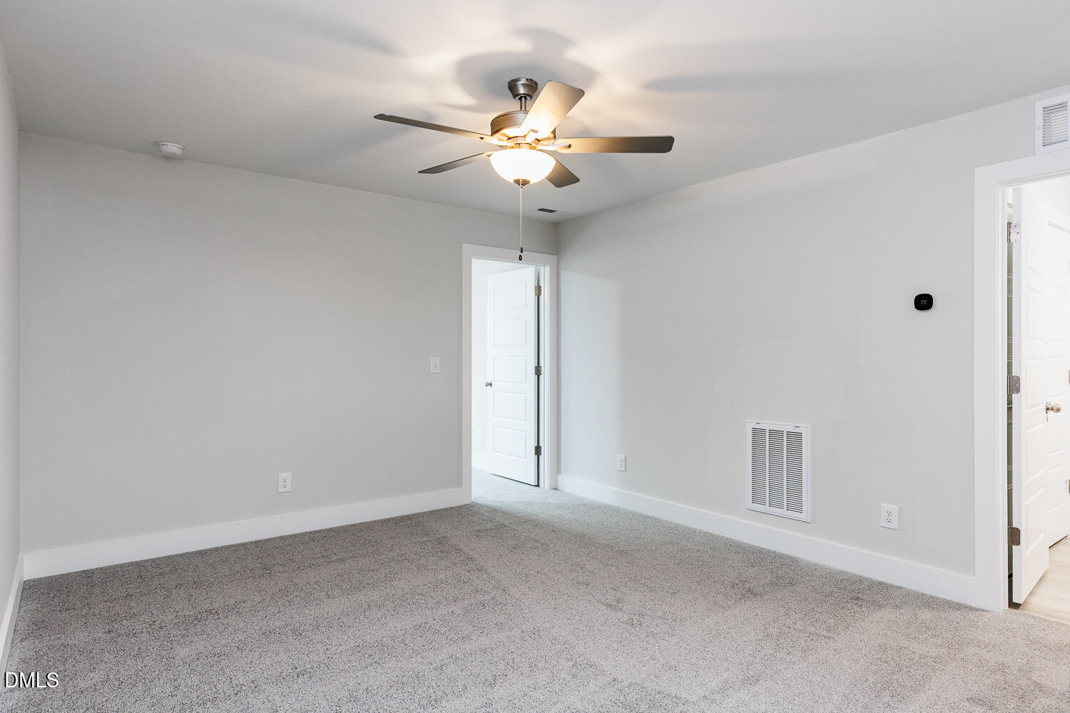 35 Silver Pne Drive Angier, NC 27501 - Photo 16 of 41 a view of an empty room with a fan