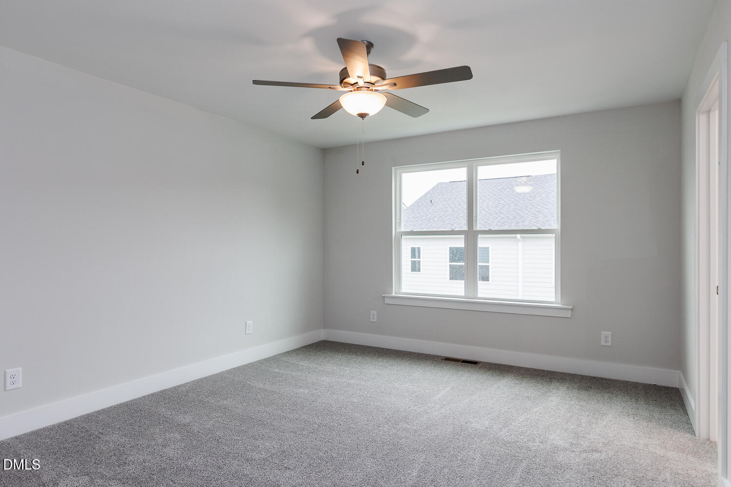 35 Silver Pne Drive Angier, NC 27501 - Photo 19 of 41 an empty room with window and ceiling fan