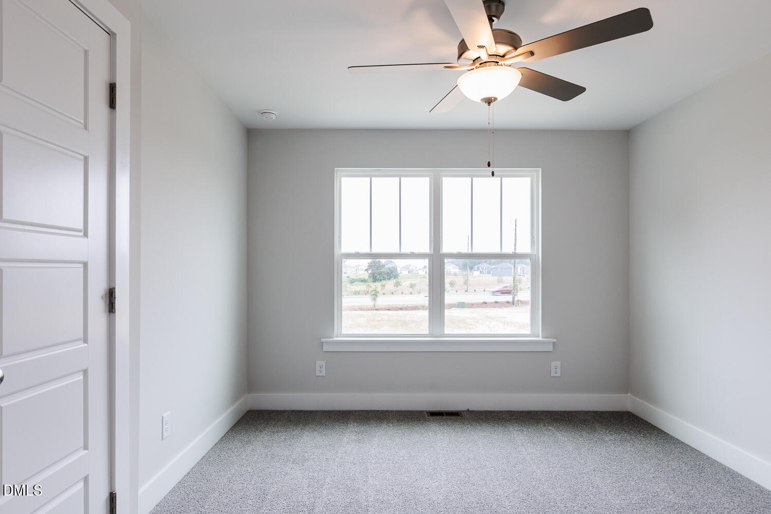 35 Silver Pne Drive Angier, NC 27501 - Photo 30 of 41 a view of room window and a ceiling fan