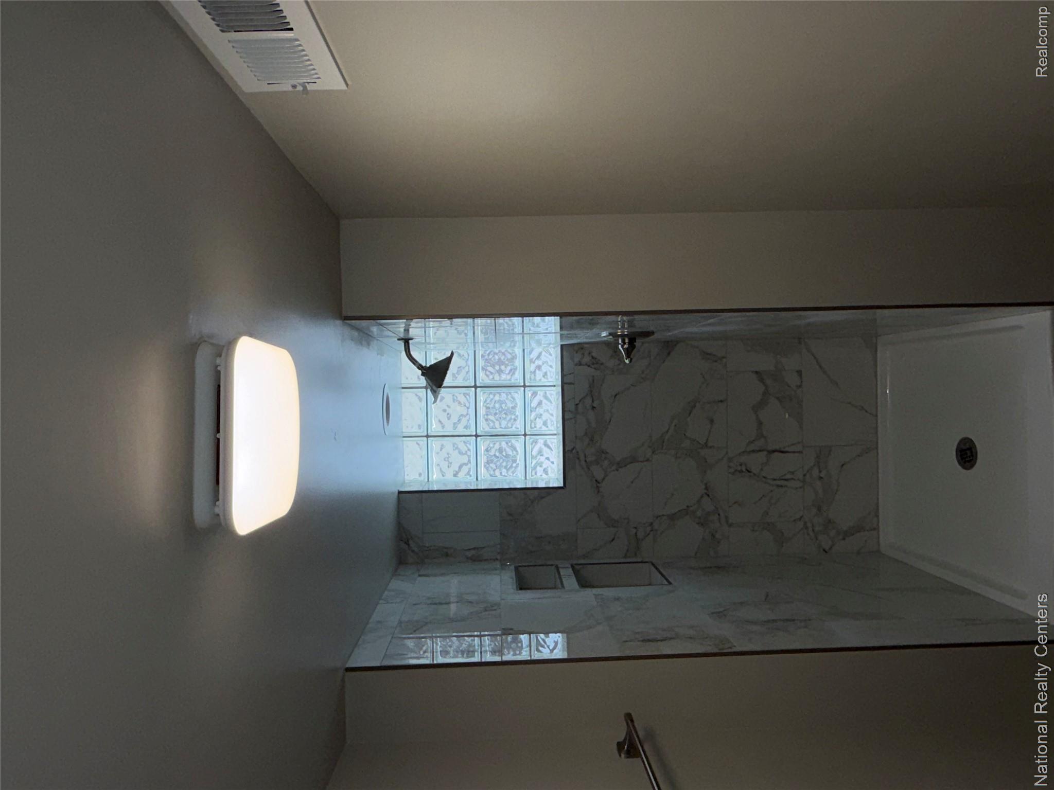 16522 Inverness Street Detroit, MI 48221 - Photo 49 of 62 Basement Full bathroom featuring a shower stall