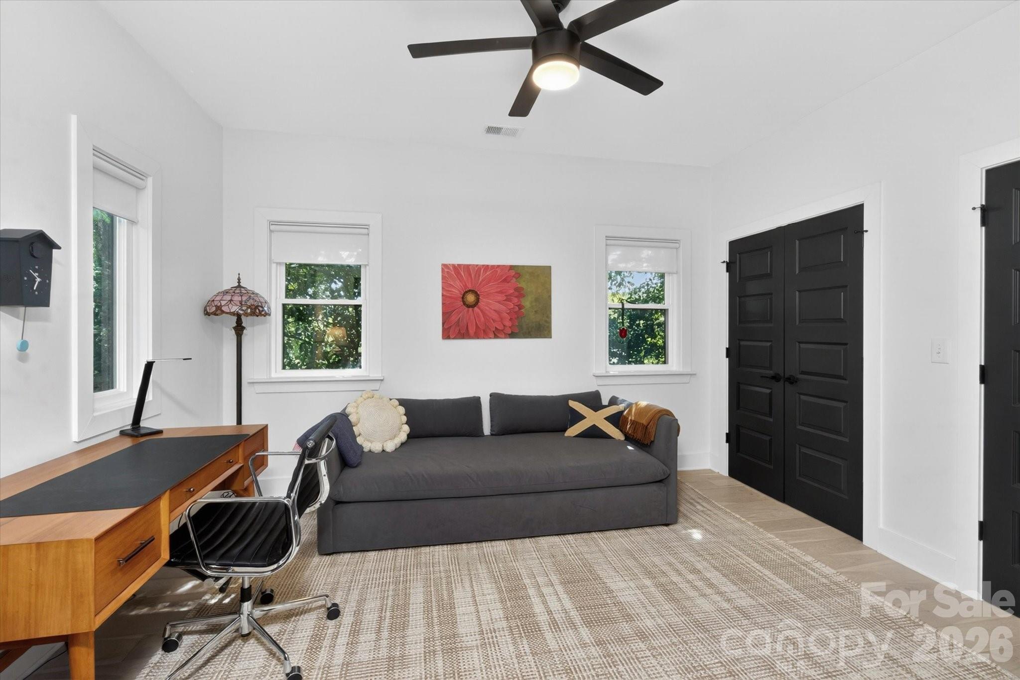 1608 Chippendale Road Charlotte, NC 28205 - Photo 43 of 46 a living room with furniture and a flat screen tv