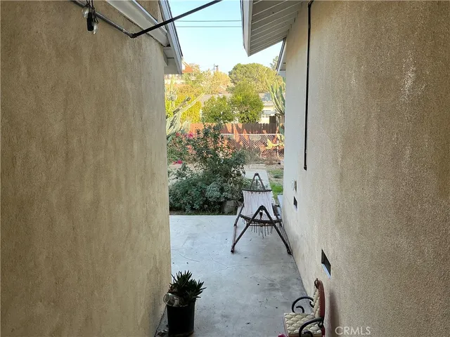 a view of a porch with furniture