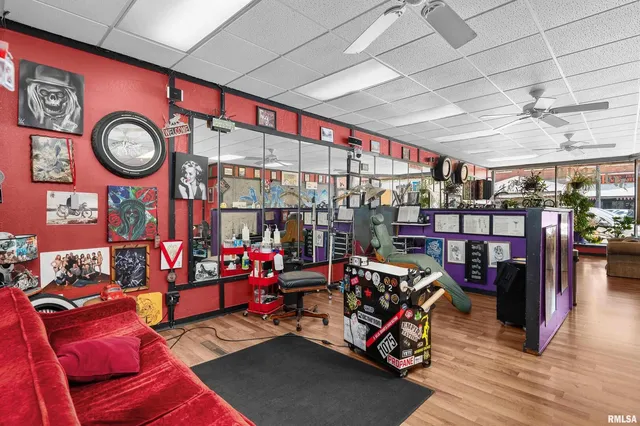 a room with furniture and wooden floor