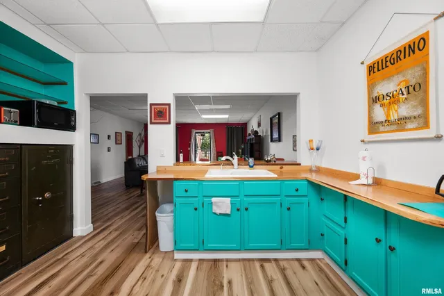 a view of a balcony with furniture